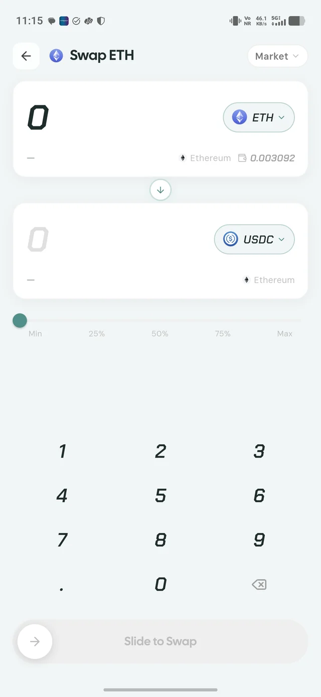 The swap screen in the Fexr Wallet app, converting ETH to USDC with an amount keypad and a slide-to-swap control.